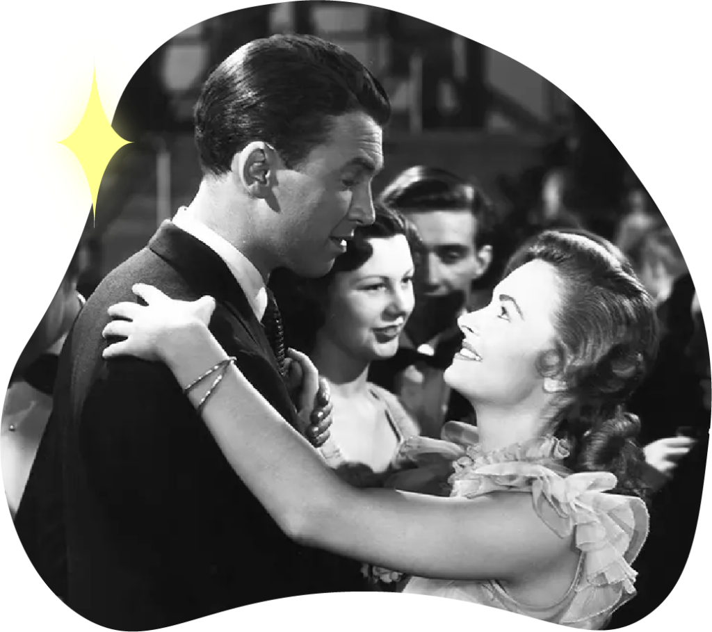 Director Frank Capra. James Stewart and Donna Reed dancing.